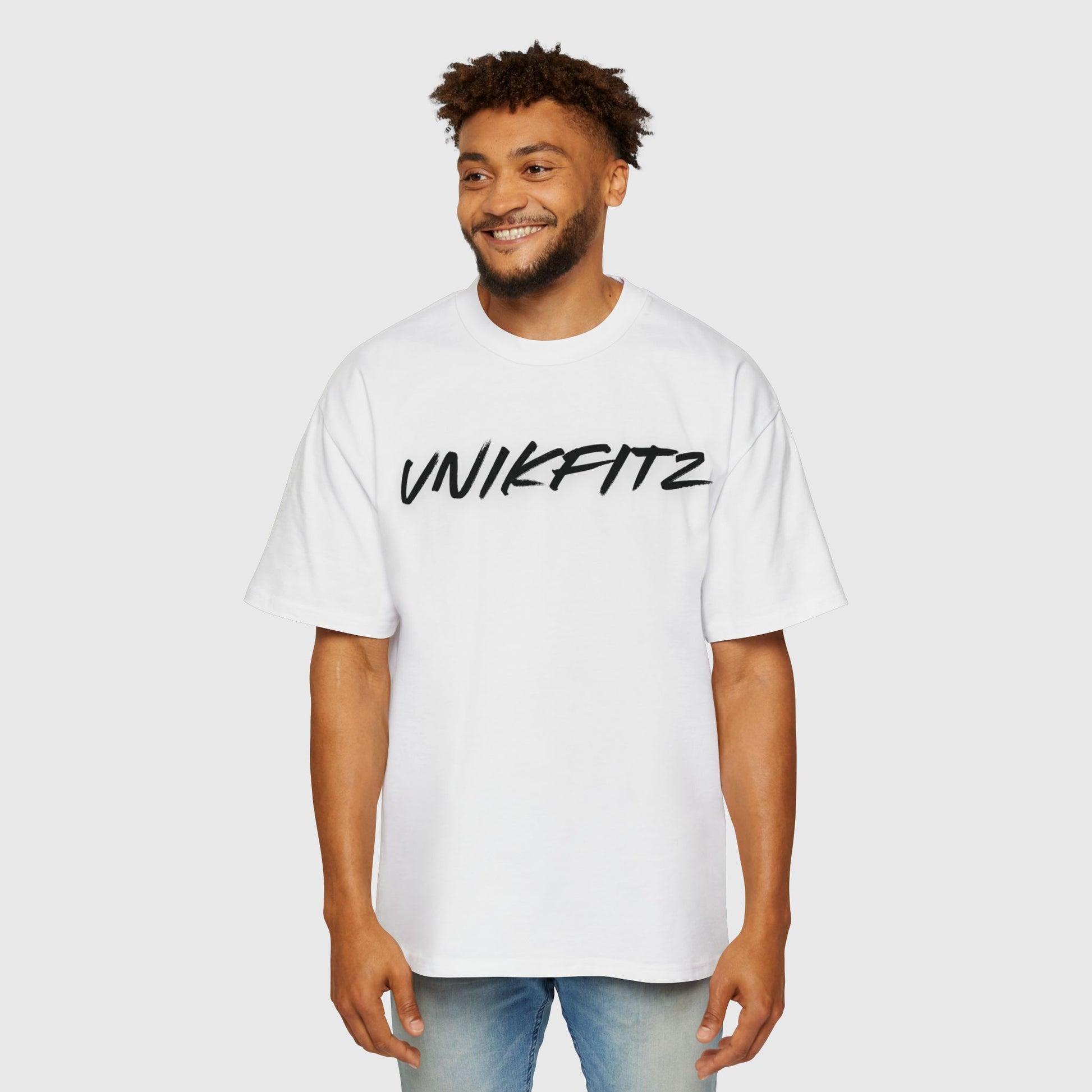 Full front view of a man in a white UNIKFITZ t-shirt, showcasing classic men's wear with minimalist streetwear design for any occasion