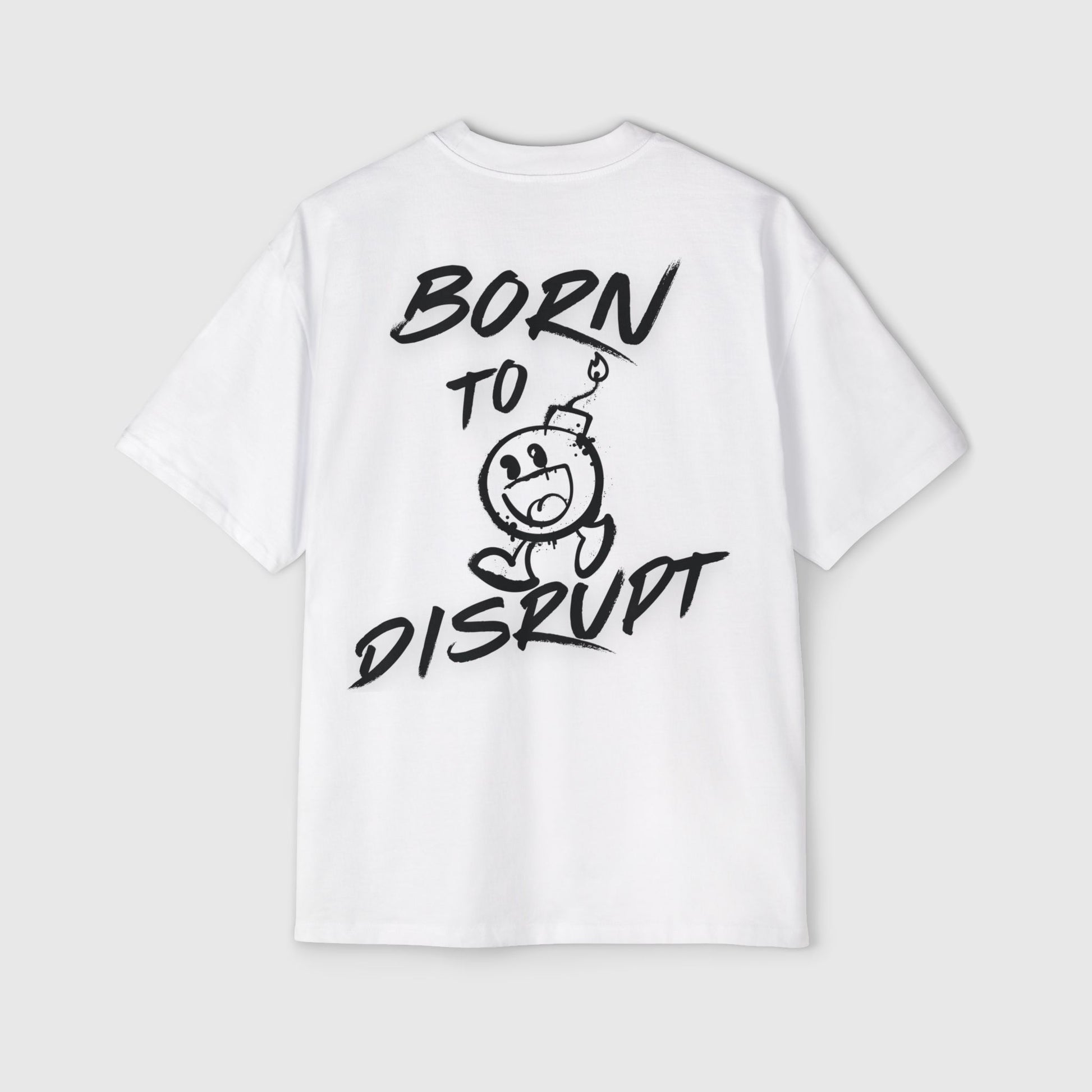 Men's white oversized t-shirt with bold 'Born to Disrupt' slogan and a cartoon bomb graphic in black, street wear-inspired design.