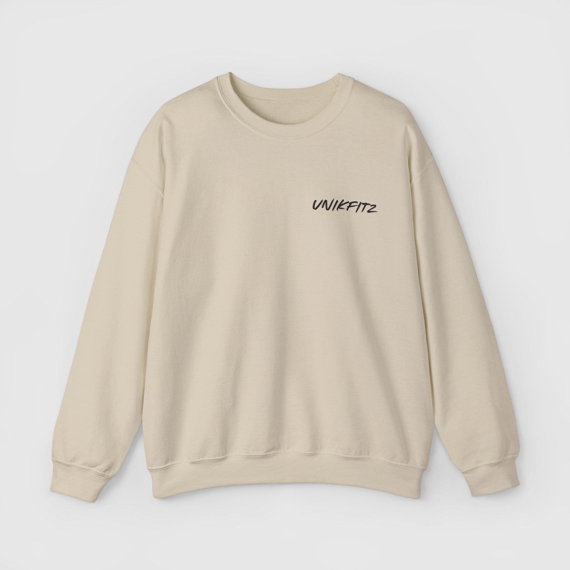 Front view of a beige essential sweatshirt with UNIKFITZ logo, offering a relaxed fit for street wear styles, gym sessions, or casual men's clothing looks