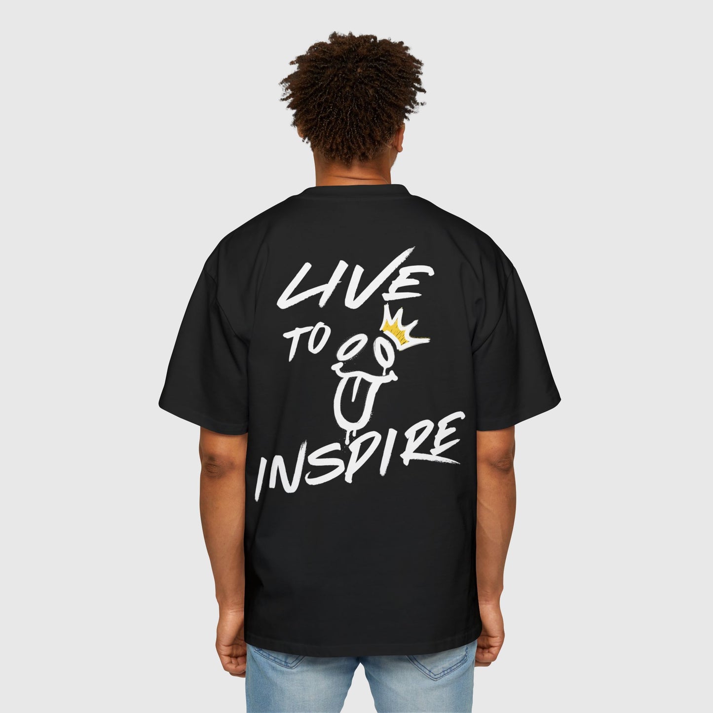 Back view of black oversized T-shirt with "Live to Inspire" slogan and a creative graphic, ideal for men's clothing gym and casual street wear.