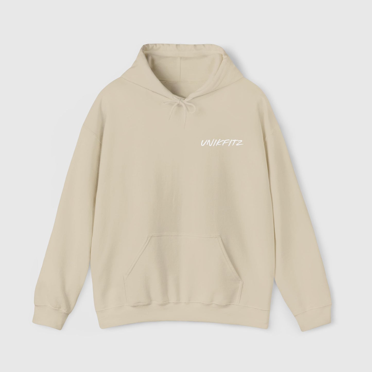 Close-up of a beige men's hoodie collar with white 'UNIKFITZ' logo on the chest. Perfect for men's clothing, gym wear, and essential streetwear for a minimalist and modern look