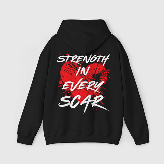 Back view of black men's hoodie with a bold red heart and 'Strength in Every Scar' design, ideal for streetwear and gym. Men's clothing that celebrates resilience and courage