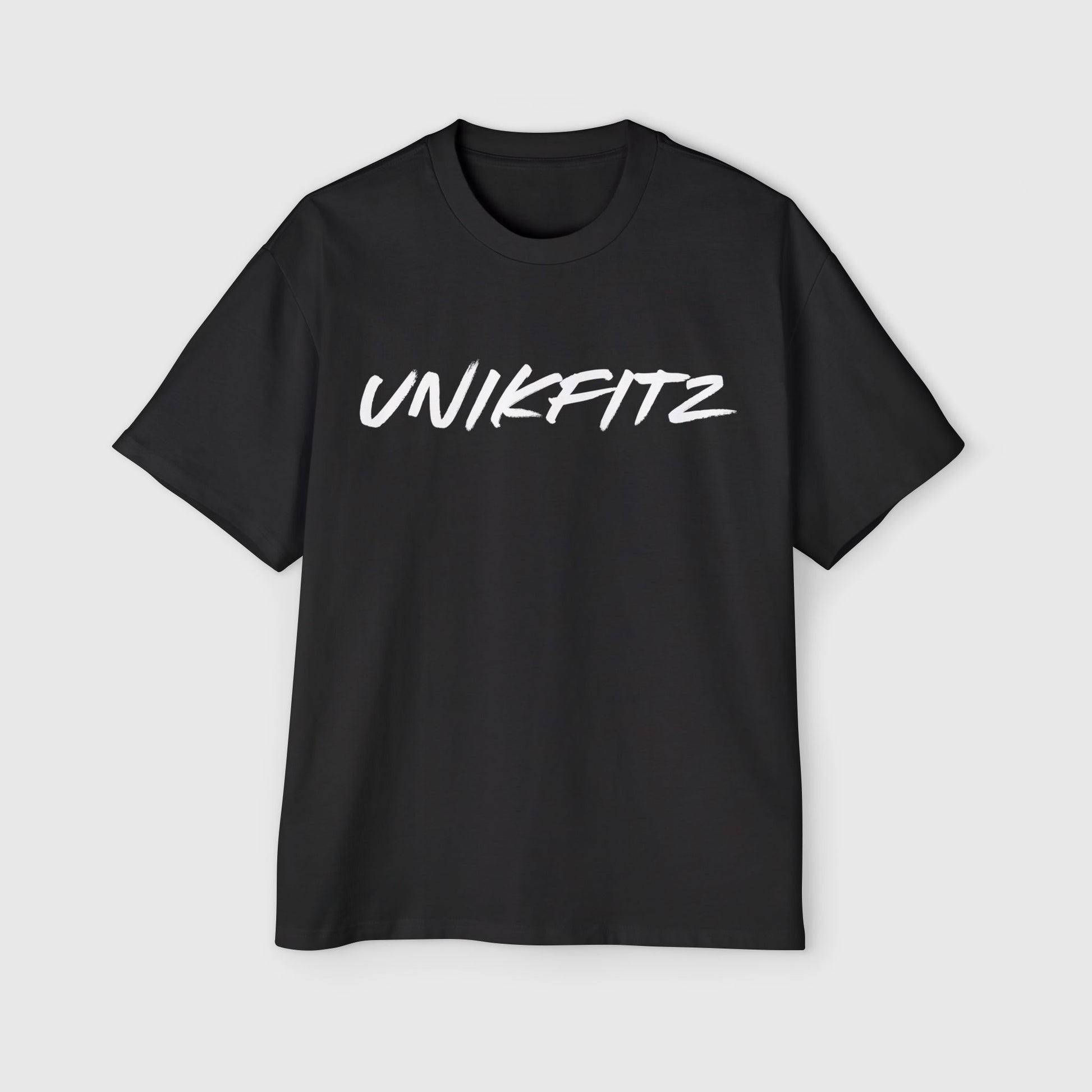 Flat-lay black men's t-shirt with bold "UNIKFITZ" logo across the chest. Perfect for men's clothing, gym wear, street wear, and an essential t-shirt for men