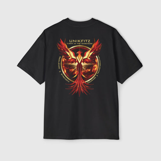 Back view of a black oversized men's t-shirt by UNIKFITZ featuring a striking red and gold phoenix graphic design. The text 'Light in the Darkness' highlights resilience, strength, courage, and transformation, making it a bold statement piece in men's street wear and gym clothing.