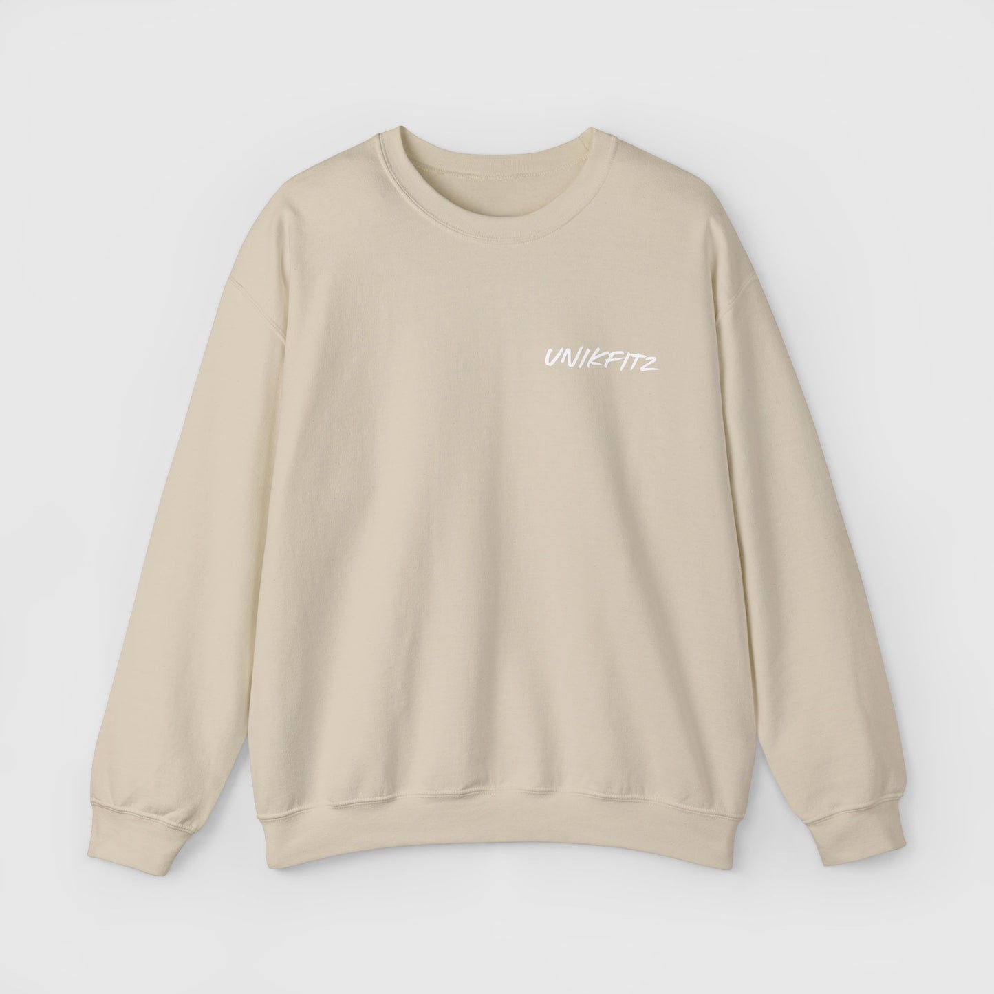 Front view of a beige sweatshirt featuring the sleek "UNIKFITZ" logo on the left chest. This sweatshirt for men blends minimalist street wear with modern comfort and essential style