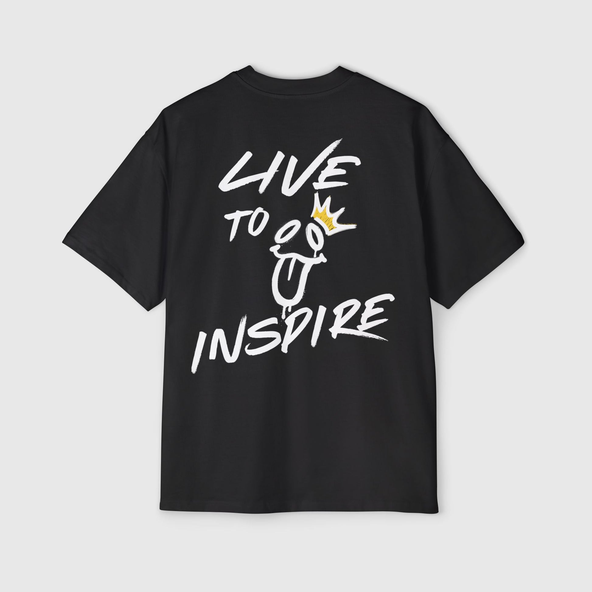 Black oversized T-shirt featuring "Live to Inspire" text and a playful graphic with a crown, perfect for street wear and casual men's clothing gym looks