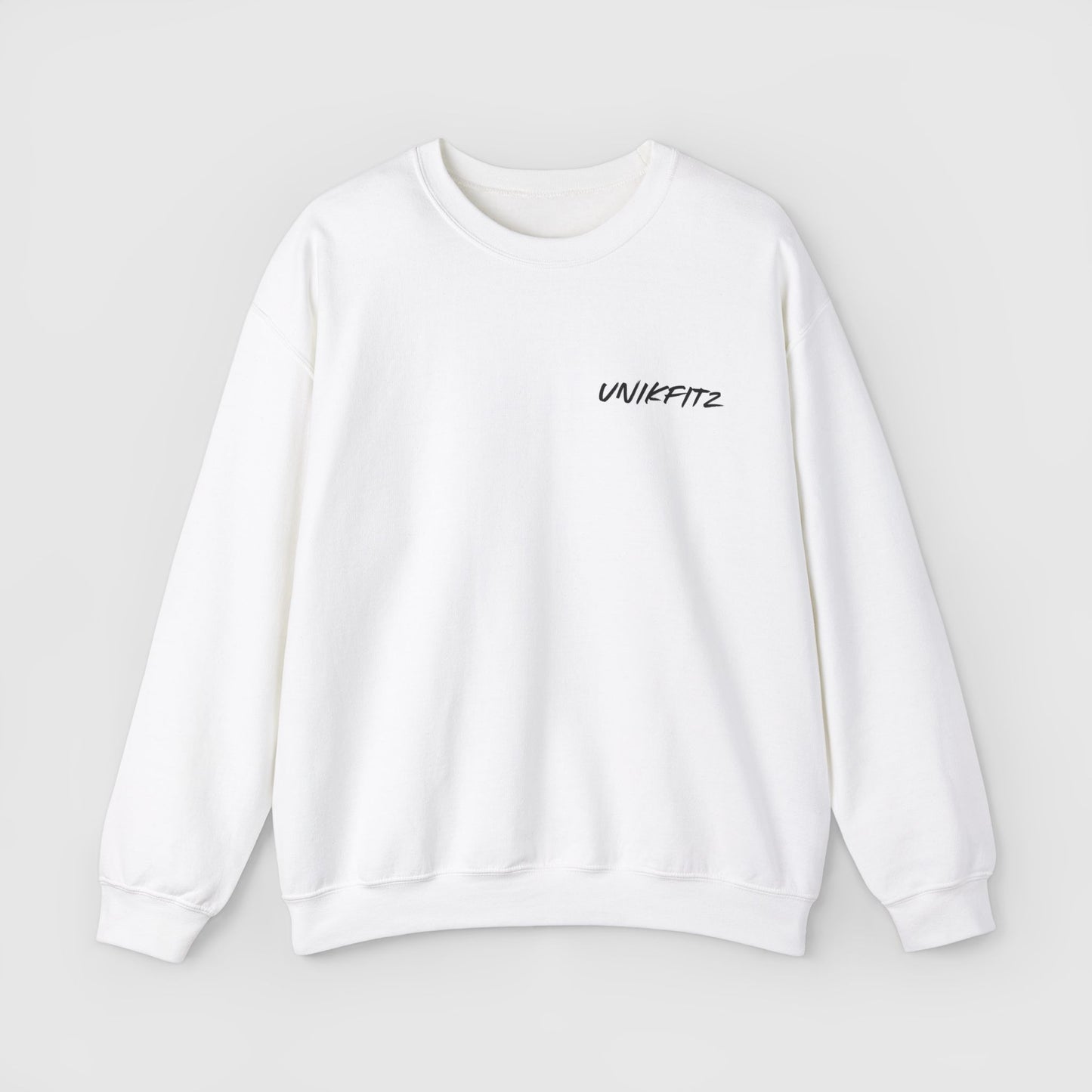 Front view of the white essential UNIKFITZ sweatshirt with a subtle black logo on the chest, blending comfort and streetwear for a timeless men's wear staple