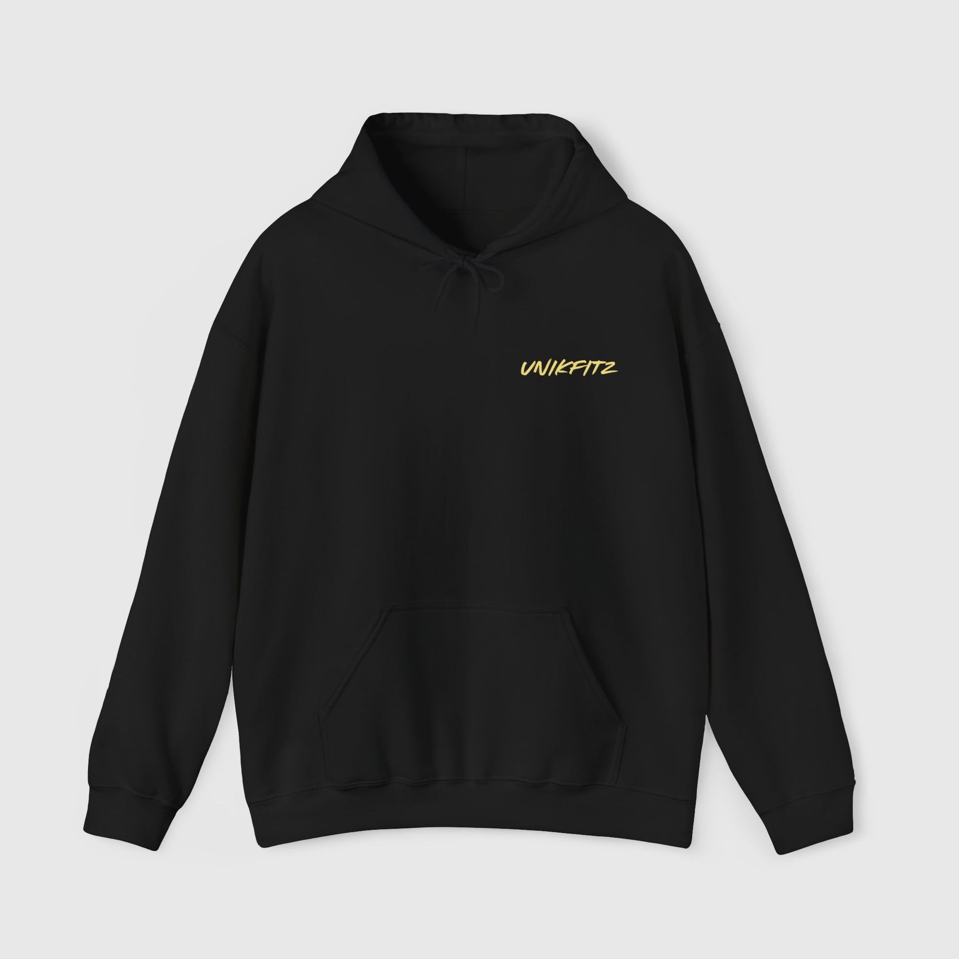 Close-up of a sleek black men's hoodie featuring the UNIKFITZ logo in bold yellow font on the chest, perfect for street wear and men's clothing gym enthusiasts, combining comfort and style