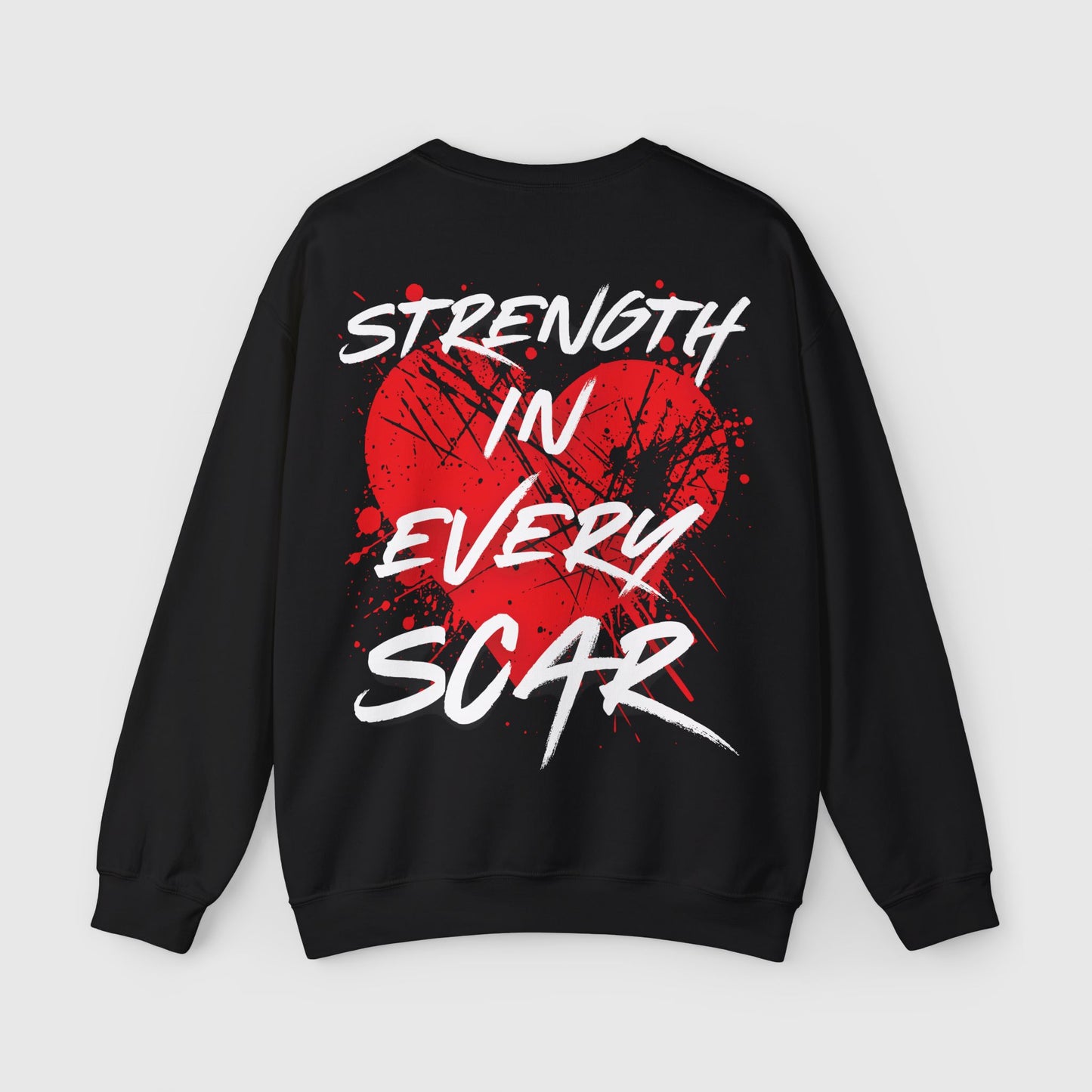 Back view of the black men's sweatshirt featuring a bold red heart and 'Strength in Every Scar' design. Ideal for streetwear and essential sweatshirts for men who value unique style