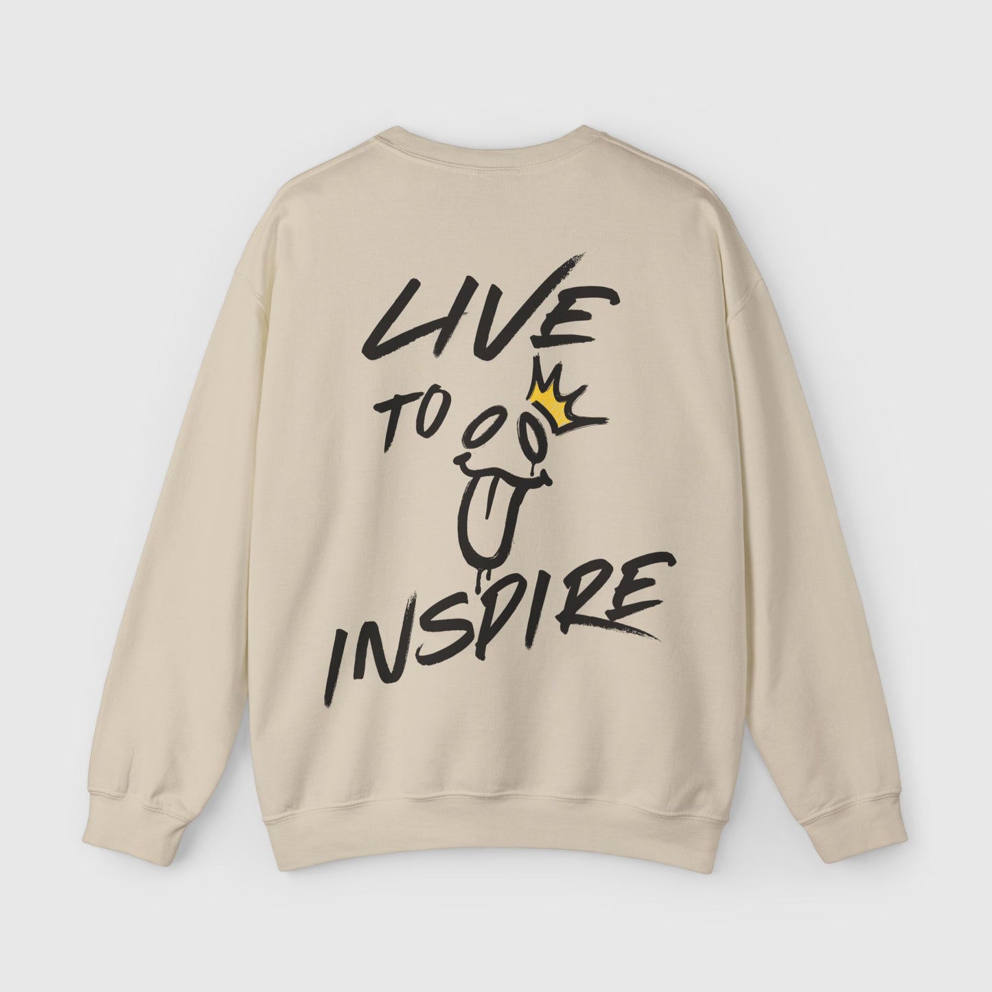 Back view of beige men's sweatshirt featuring a bold 'LIVE TO INSPIRE' graphic with playful doodle design and crown motif. Essential streetwear and gym style for the modern wardrobe.