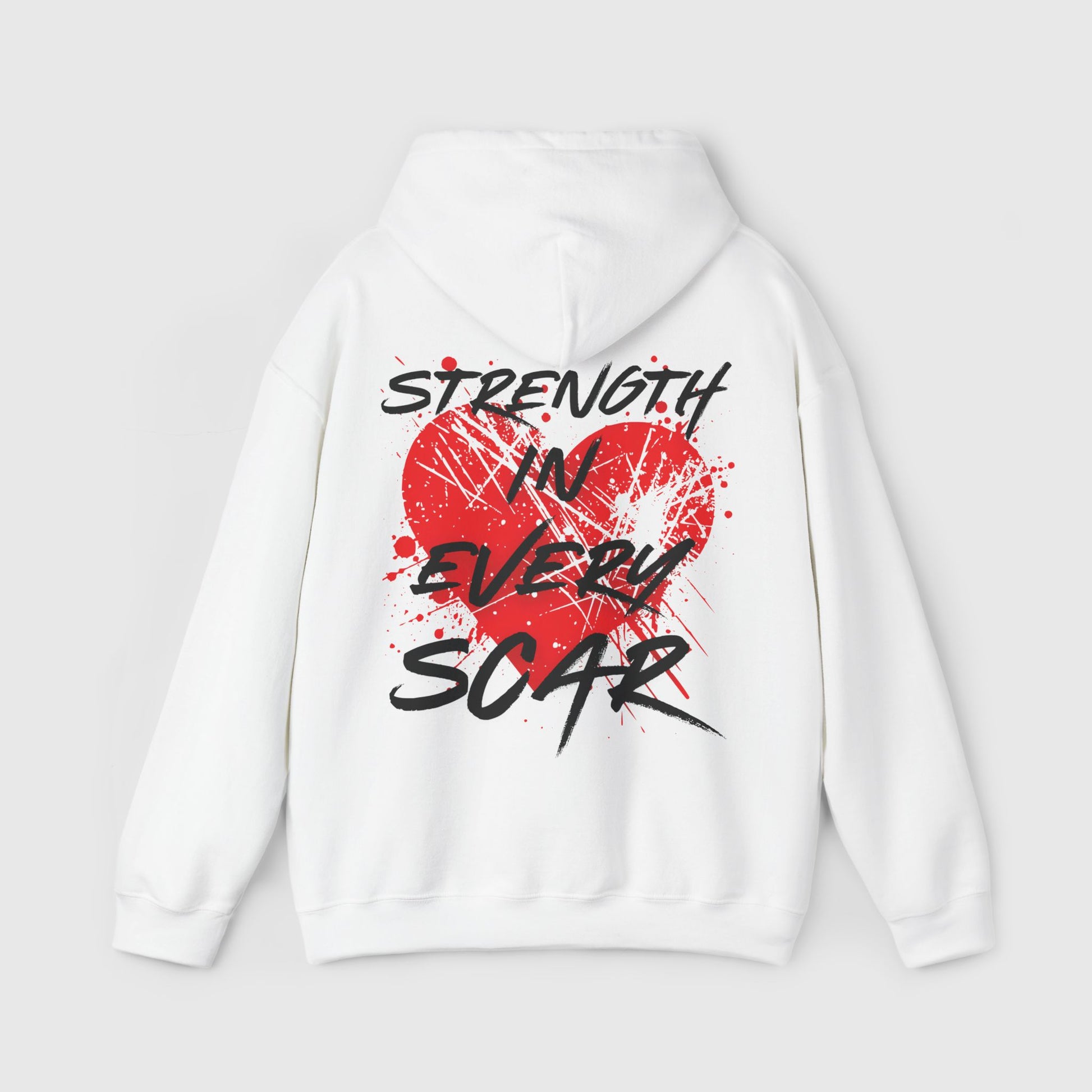 Back of a white hoodie featuring bold red heart graphic with 'Strength in Every Scar' text. A men's essential hoodie embodying resilience, streetwear inspiration, and bold men's wear style