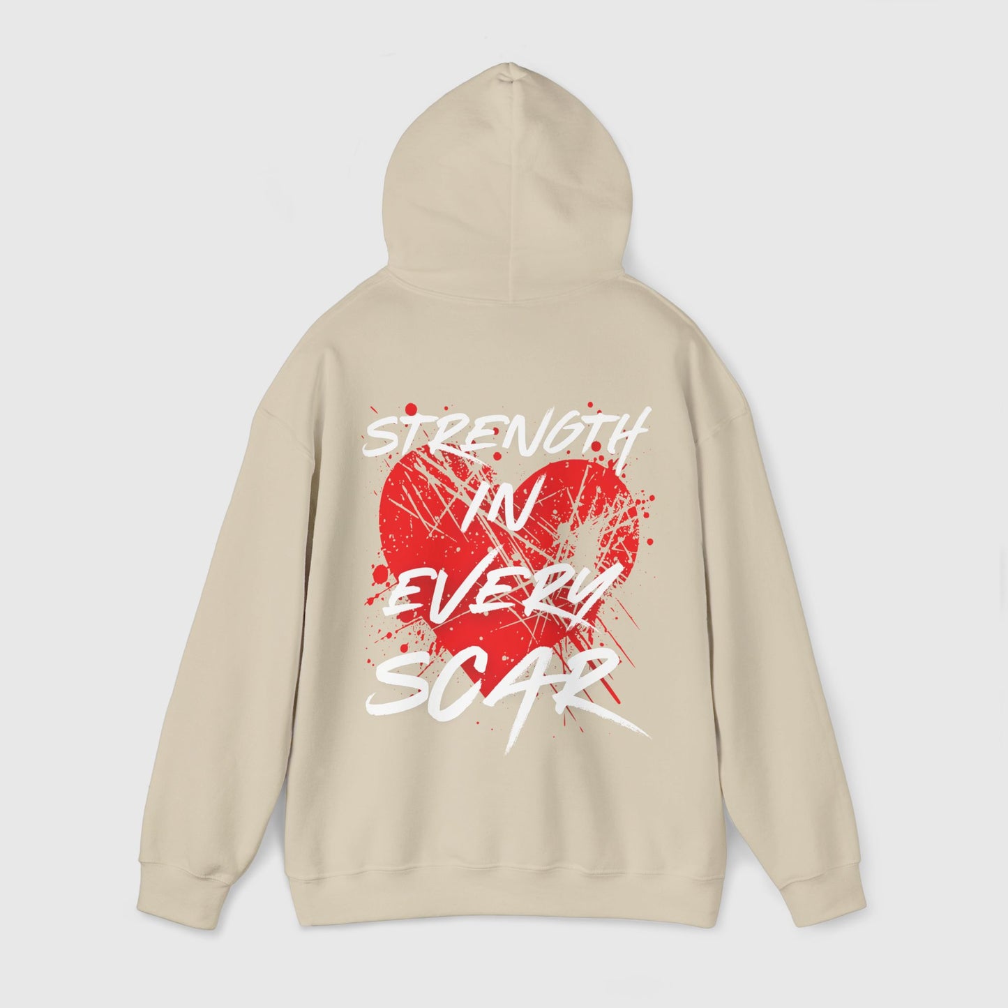 Back view of the Strength in Every Scar beige hoodie with a bold red heart design and white splatter graphics. An essential men's hoodie for fearless misfits who value resilience and street wear style.