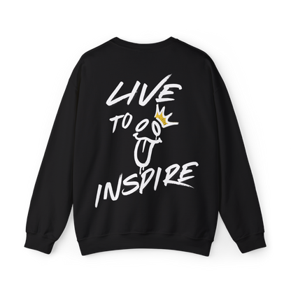 Back view of the Live to Inspire Women's Black Sweatshirt in white, featuring a bold hand-drawn graffiti-style 'Live to Inspire' graphic with a playful smiley face and golden crown. A statement-making Australian streetwear piece, blending gym wear, women's clothing, and artistic self-expression.