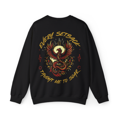 Back view of the Rise and Soar Women's Sweatshirt in black, featuring a striking phoenix graphic in gold and red, with the phrase 'Every Setback Taught Me to Soar.' A bold statement piece in Australian streetwear, perfect for gym wear, women's clothing, and urban fashion.