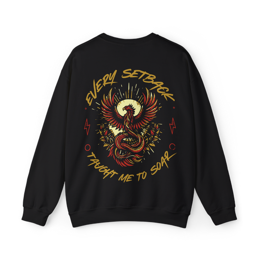 Back view of the Rise and Soar Women's Sweatshirt in black, featuring a striking phoenix graphic in gold and red, with the phrase 'Every Setback Taught Me to Soar.' A bold statement piece in Australian streetwear, perfect for gym wear, women's clothing, and urban fashion.