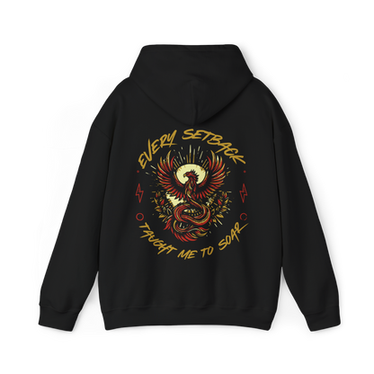 Back view of the Rise and Soar women's black Hoodie, featuring a striking phoenix-inspired print with the phrase 'Every Setback Taught Me to Soar' in bold typography. A powerful statement piece in Australian streetwear and women's clothing gym fashion, combining motivation and urban style.