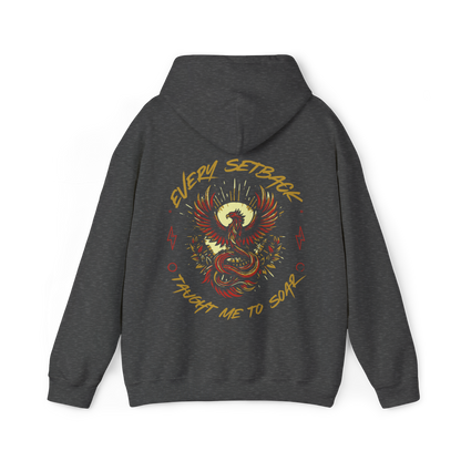 Back view of the Rise and Soar women's charcoal grey Hoodie, featuring a striking phoenix-inspired print with the phrase 'Every Setback Taught Me to Soar' in bold typography. A powerful statement piece in Australian streetwear and women's clothing gym fashion, combining motivation and urban style.