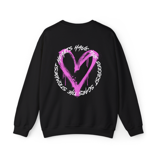 Back design of the Scarred Heart Women's black Sweatshirt by UNIKFITZ, featuring a statement graffiti-style pink heart graphic with bold typography. This street wear staple is perfect for those who embrace self-expression, offering a modern twist on men's t-shirt essential fashion with a bold and artistic touch.