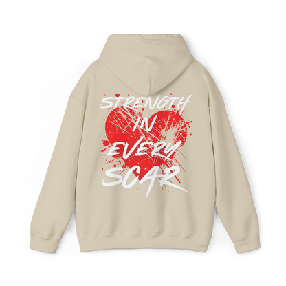 Back of the Scarred women's beige Hoodie – striking 'Strength in Every Scar' typography with a bold red heart and distressed graphic print, embodying resilience and Australian streetwear culture