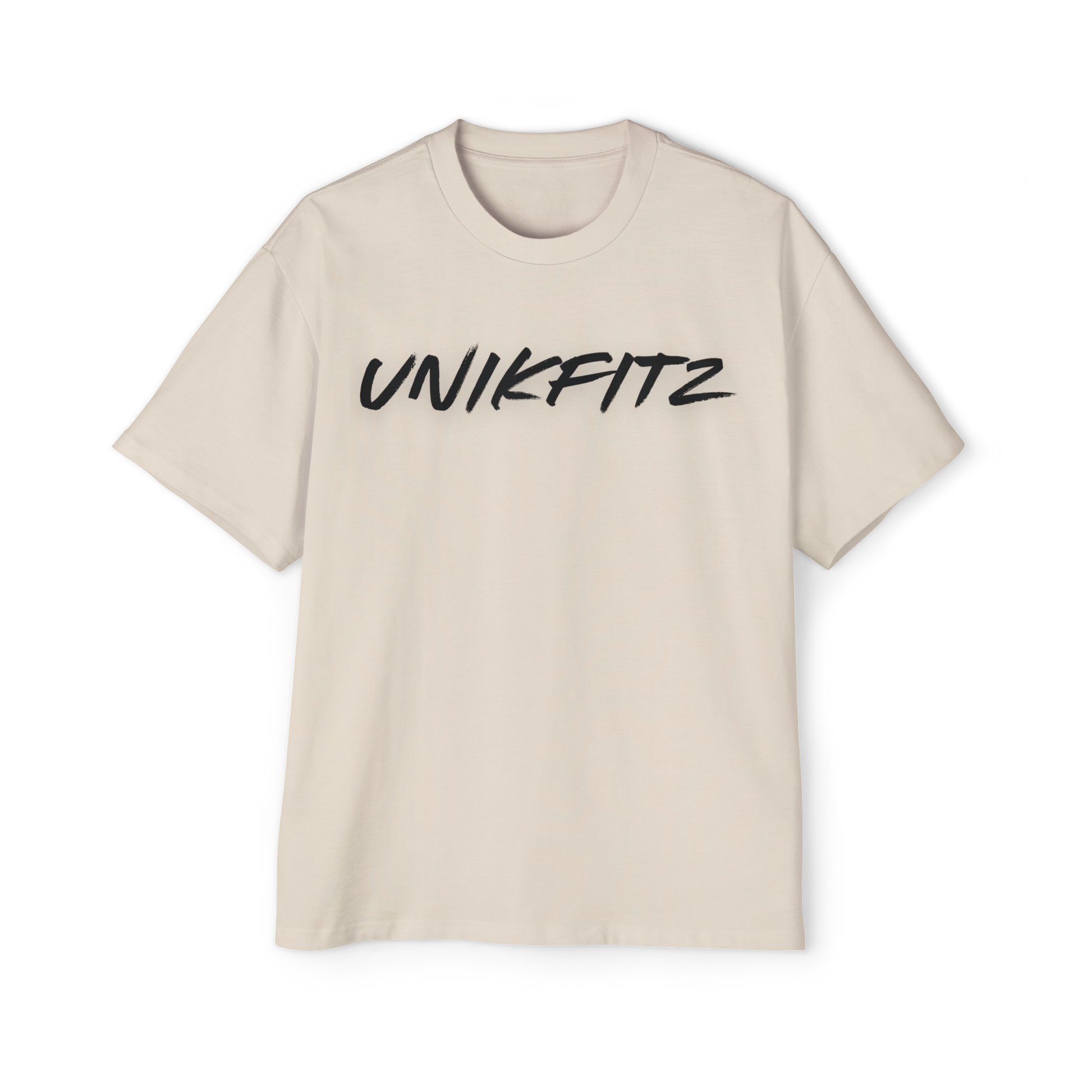 Born to Disrupt oversized t-shirt in beige, featuring a bold 'UNIKFITZ' logo on the front. This premium Australian streetwear women's clothing piece is crafted from heavyweight cotton for a structured fit, making it a women’s t-shirt essential for streetwear lovers and gym enthusiasts