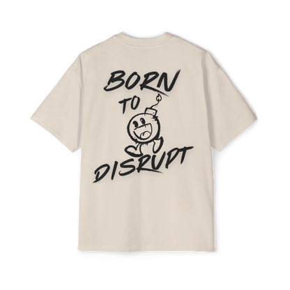 Back view of the 'Born to Disrupt' oversized t-shirt in beige, showcasing graffiti-inspired typography with a rebellious cartoon bomb graphic. This streetwear women's t-shirt is designed for those who challenge norms, with a bold look and premium fabric that fits perfectly into women’s gym clothing and urban fashion